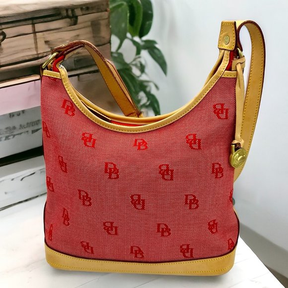 Dooney & Bourke Handbags - ⭐️⭐️SOLD⭐️⭐️ Dooney & Bourke Signature Canvas/Leather Shoulder Tote